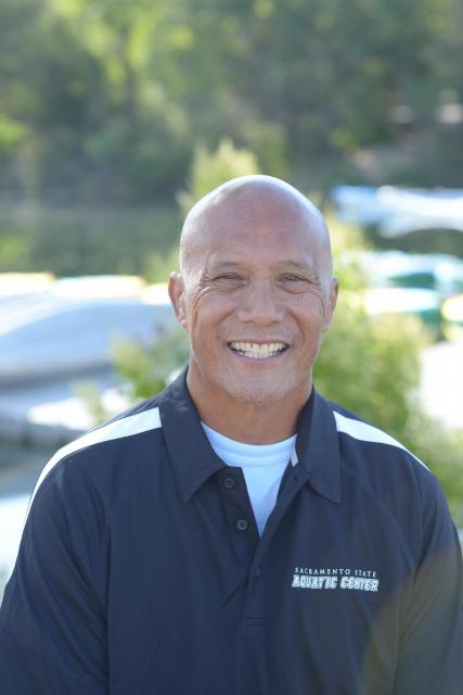 Head shot of John Aquino