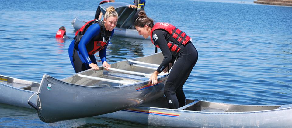 women canoeing