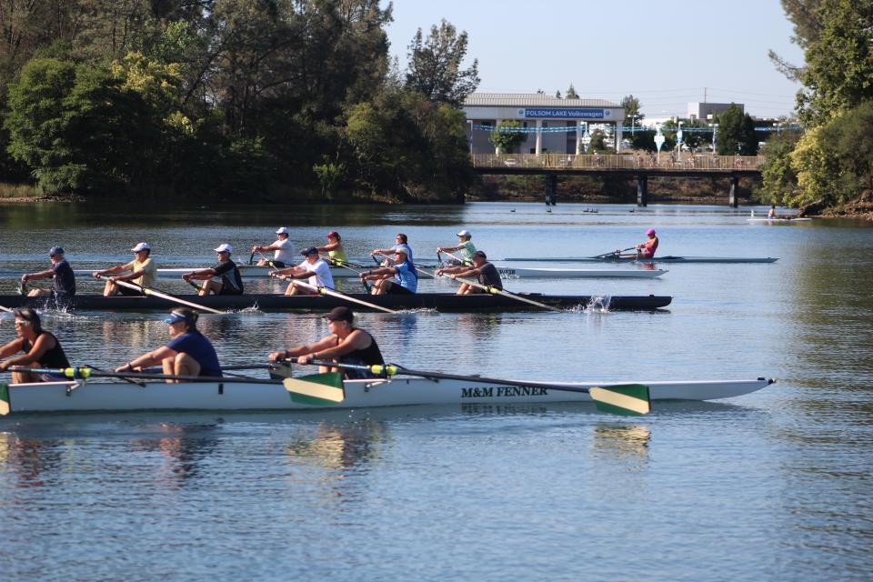 people rowing