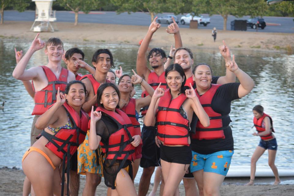 Sac State students on the beach at Lake Natoma