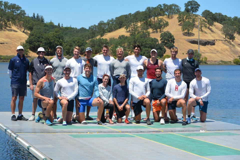 US Men's national rowing team standing on dock