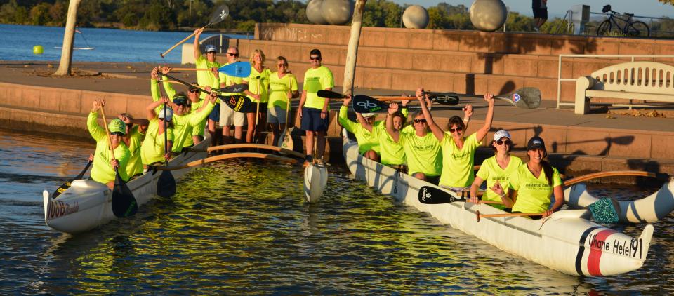 group of rowers in outrigger canoe