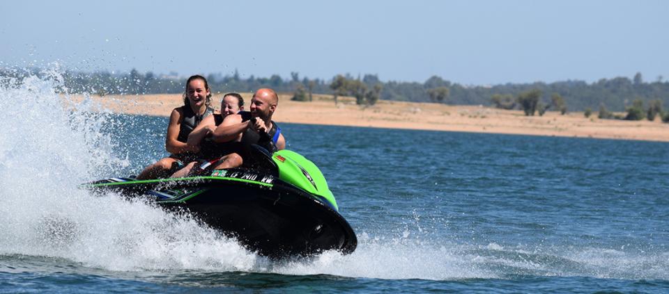 family jetskiing