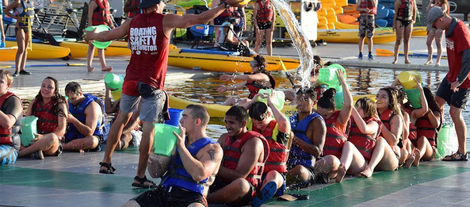 group of people playing water games