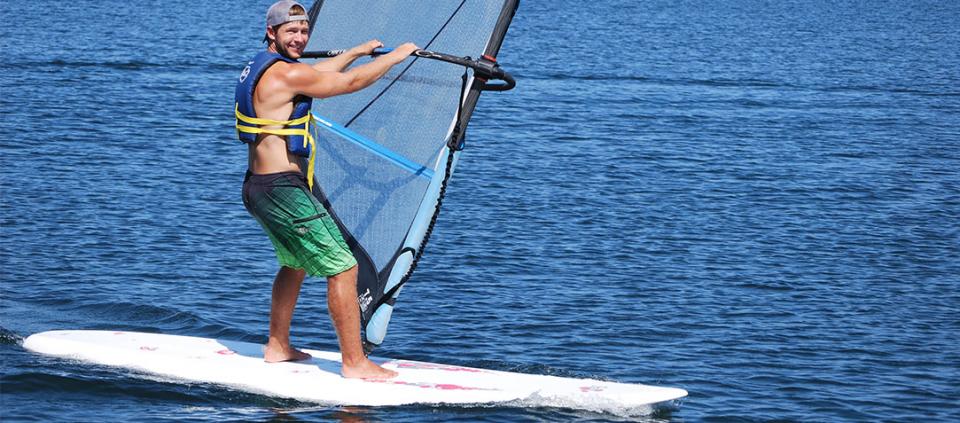 man windsurfing