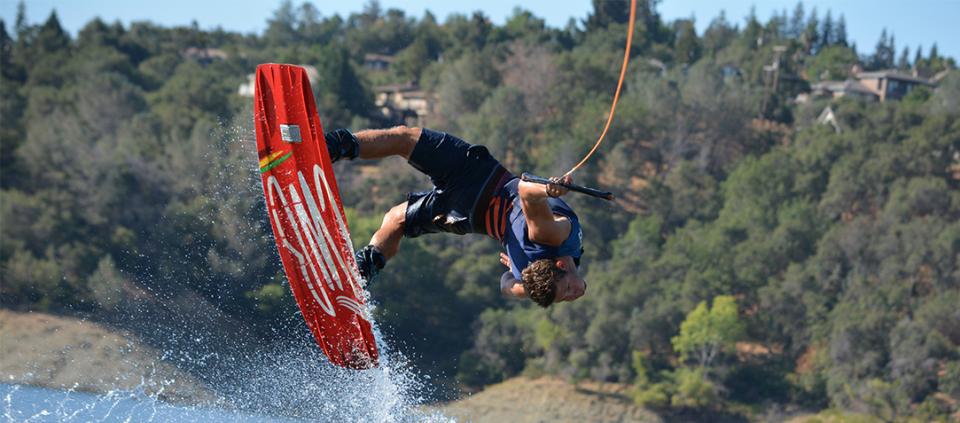 man doing wakeboarding trick