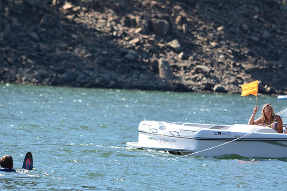 people on a speedboat