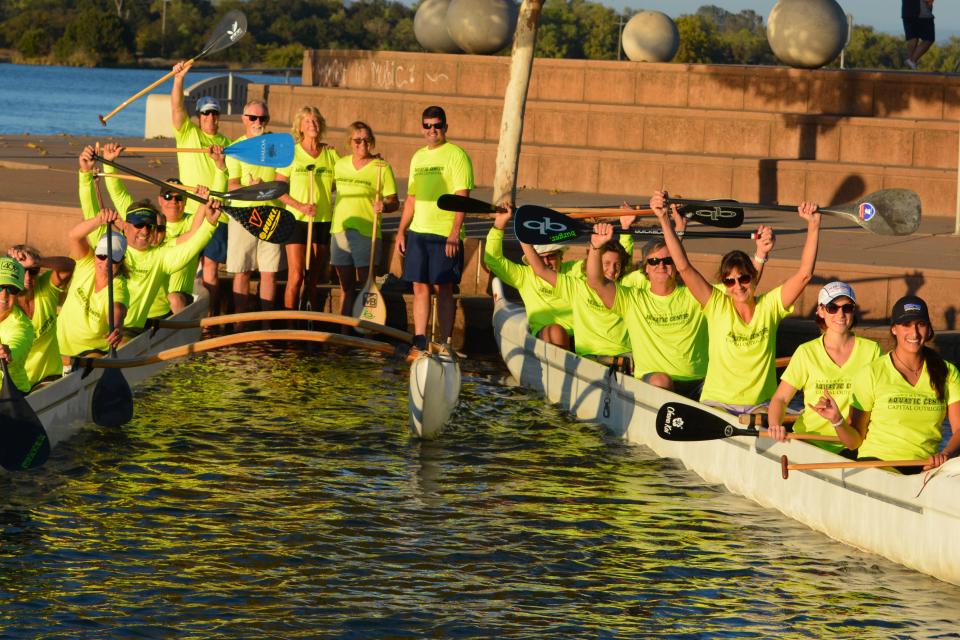 group of rowers in outrigger canoe