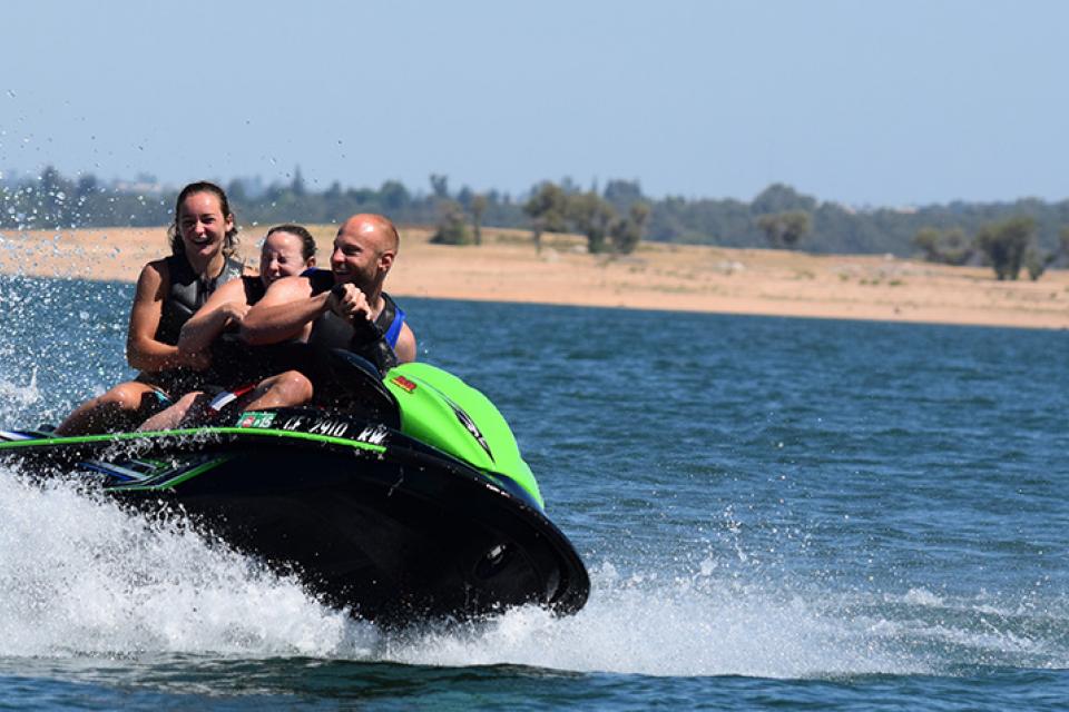 family jetskiing