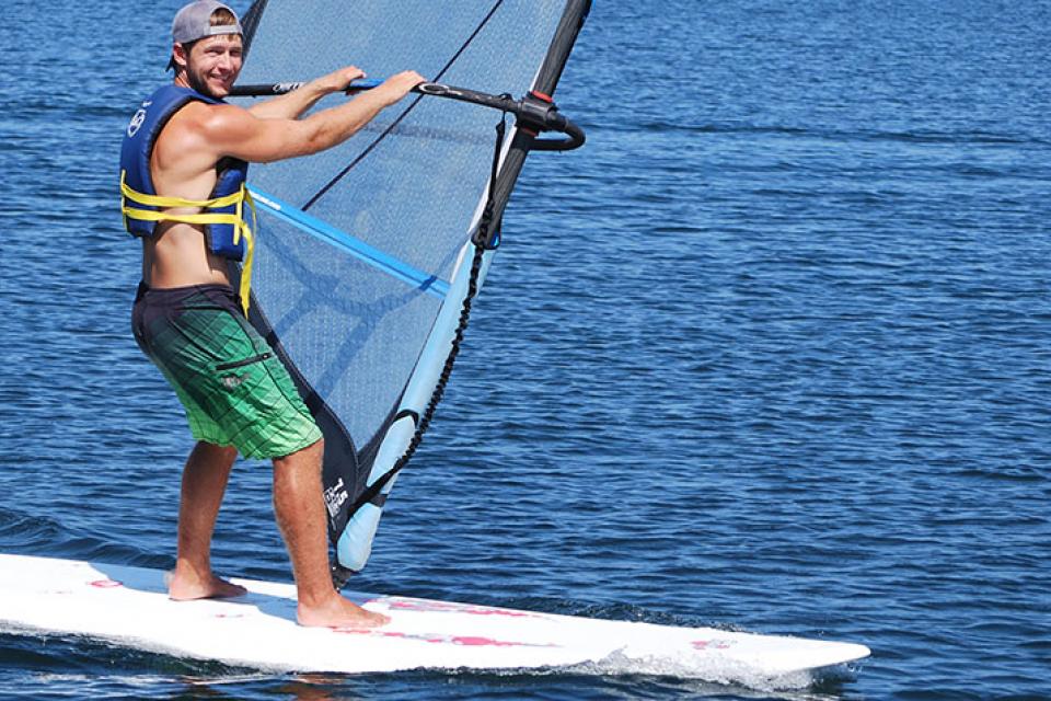 man windsurfing