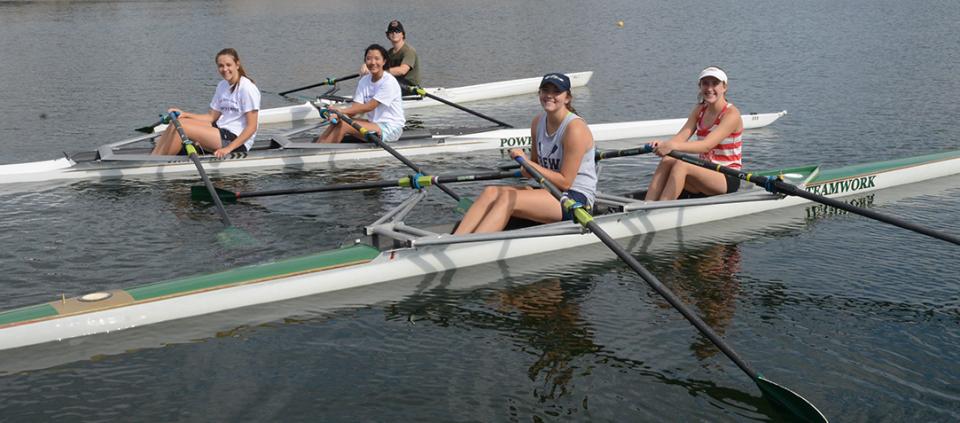 group of rowers smiling
